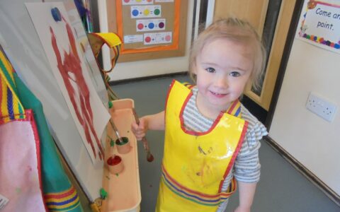 Girl painting at Happy Kids Thrybergh, Rotherham