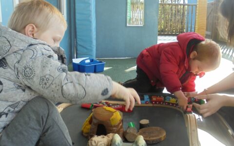 Boys playing with train at Happy Kids Thrybergh, Rotherham